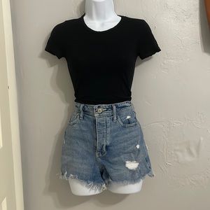 Jean shorts with black crop top and button up white shirt